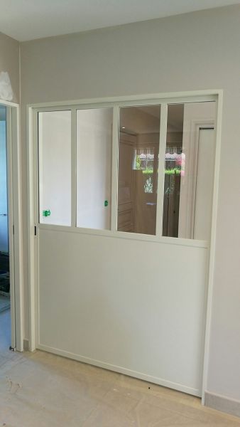 Fabrication et installation d'une verrière d'atelier aux finition laquée blanche à Lyon