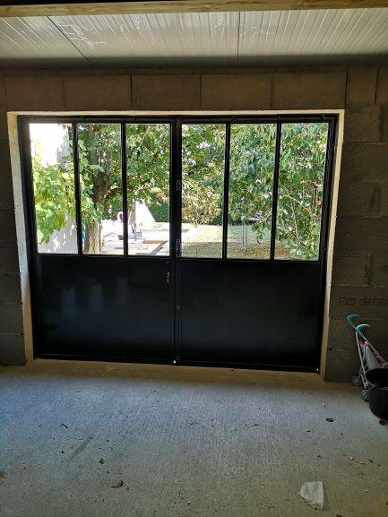 Fabrication et pose d'une verrière à porte battante à Chaponost